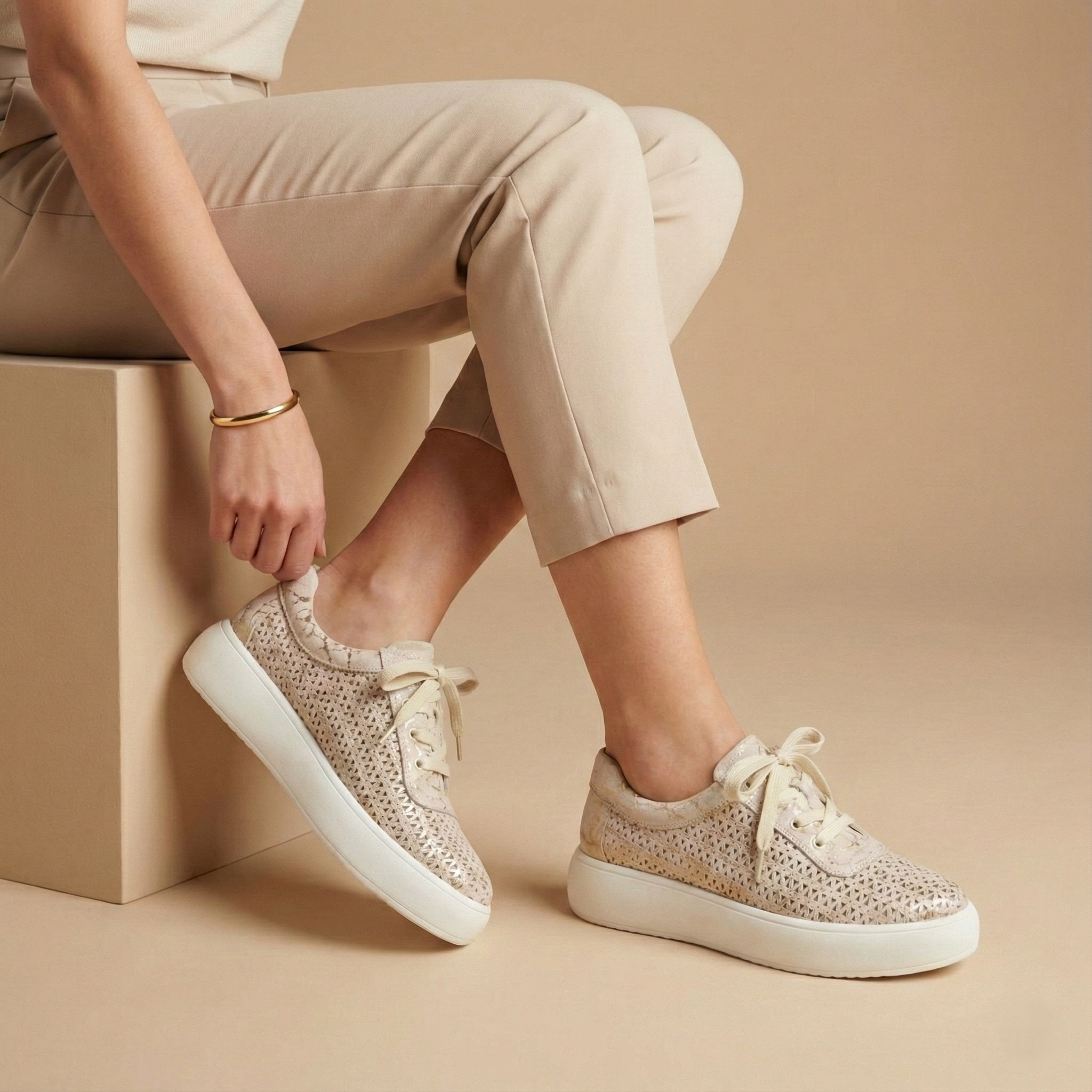 Celia Gold Perforated Platform Sneaker