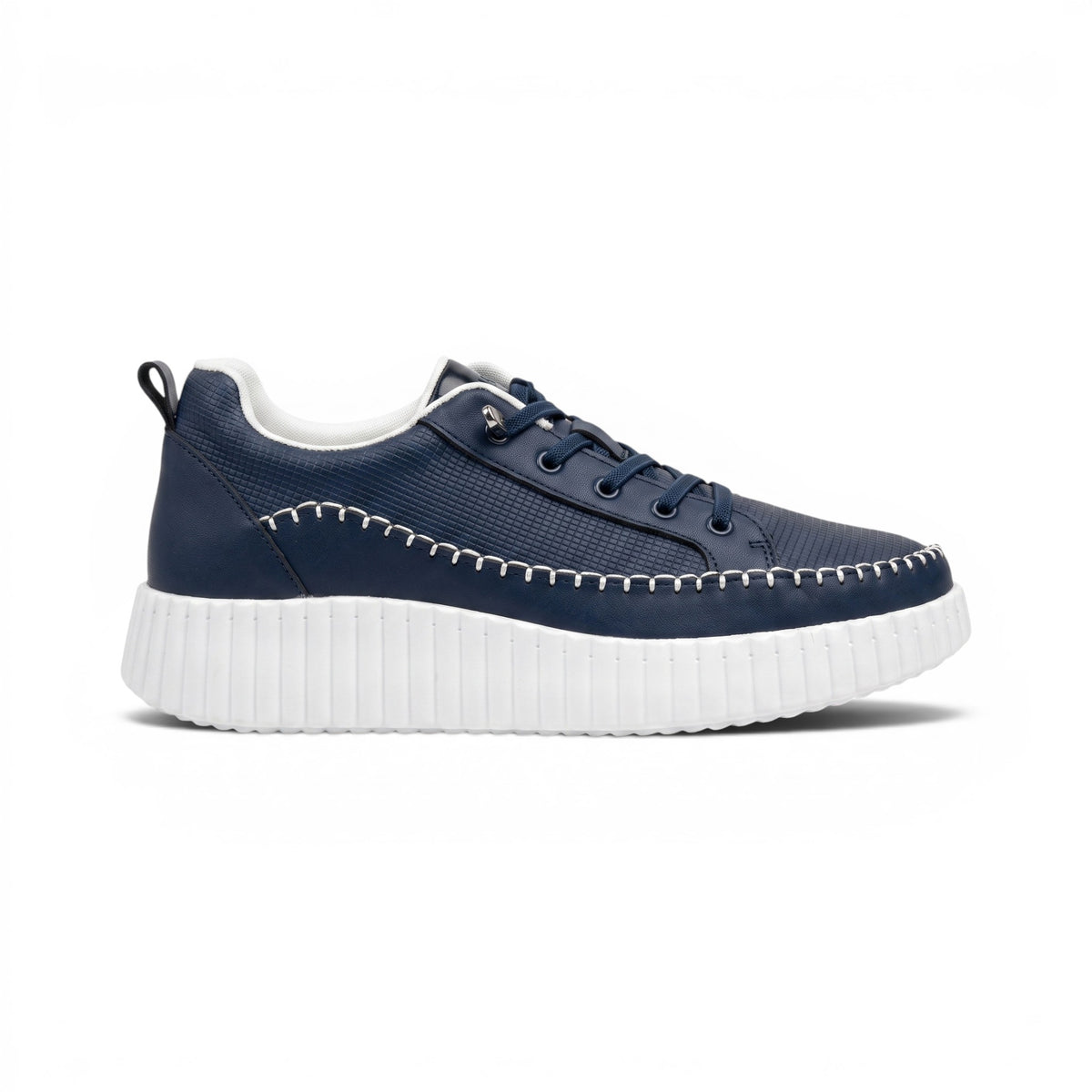 A navy blue platform sneaker with a textured upper, matching navy laces, white contrast stitching around the toe, and a thick white platform sole, shown against a plain white background.