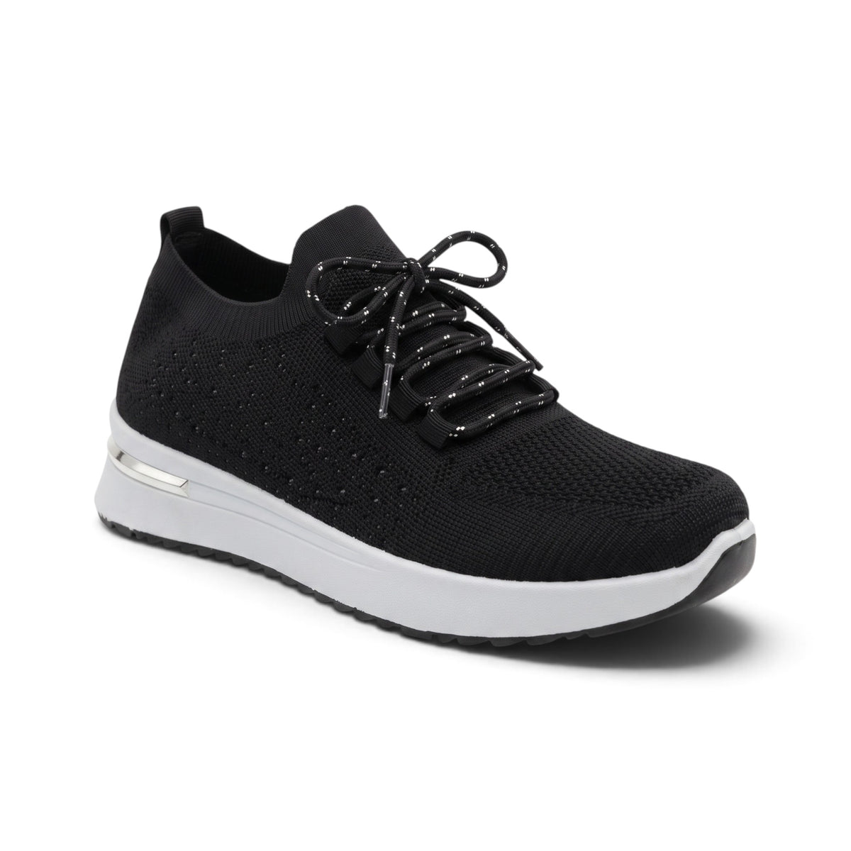 A black knit slip-on sneaker with black laces and a thick white sole, shown from a three-quarters angle on a white background.