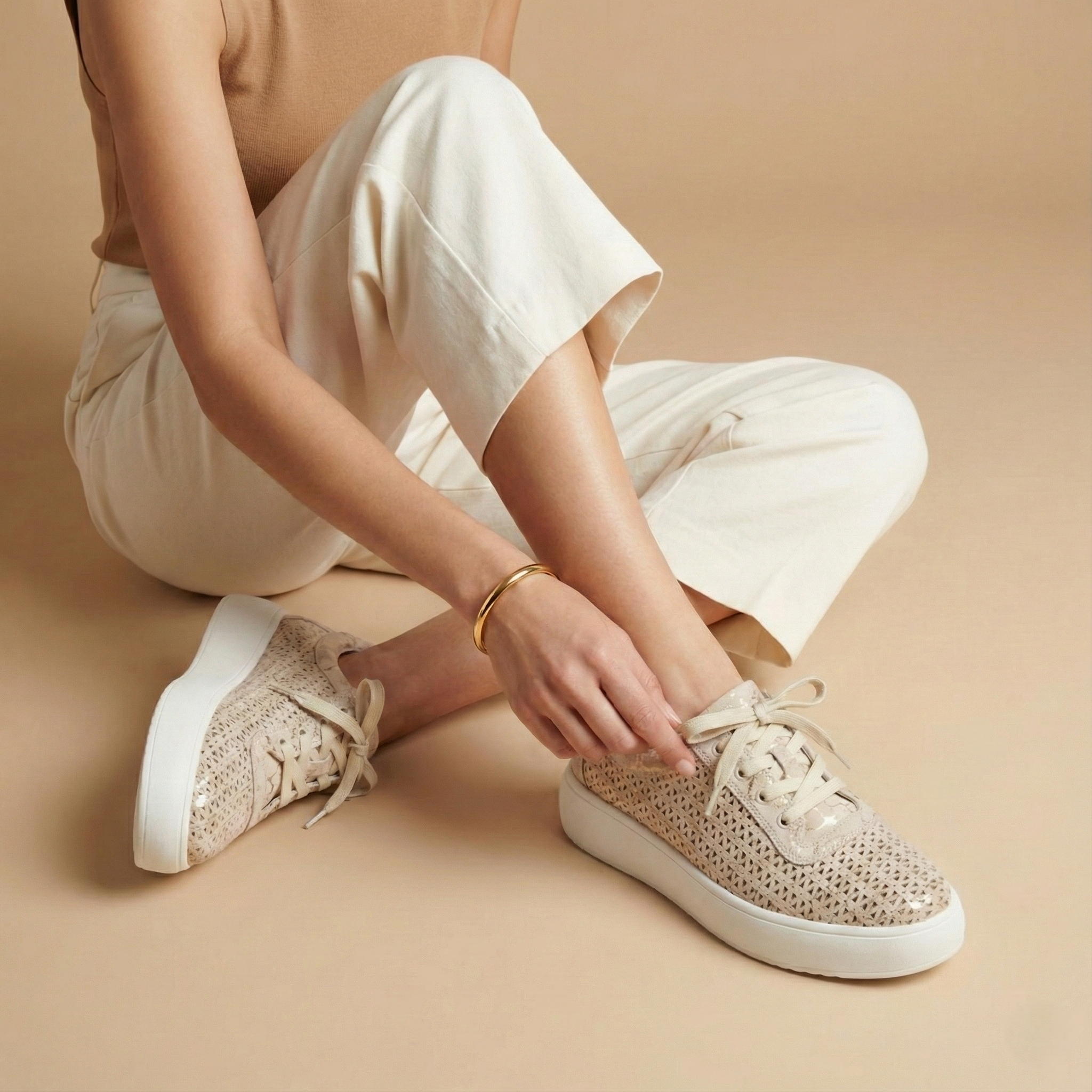 Celia Gold Perforated Platform Sneaker