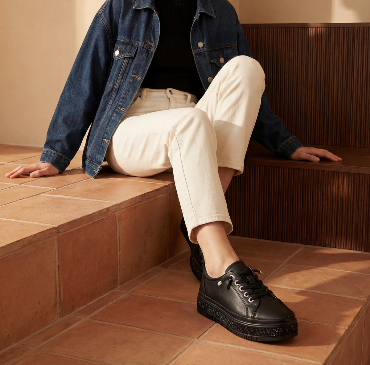 A black diamante platform sneaker with sparkling sole detail, silver-tone hardware and a lightweight cushioned platform for comfortable everyday wear.