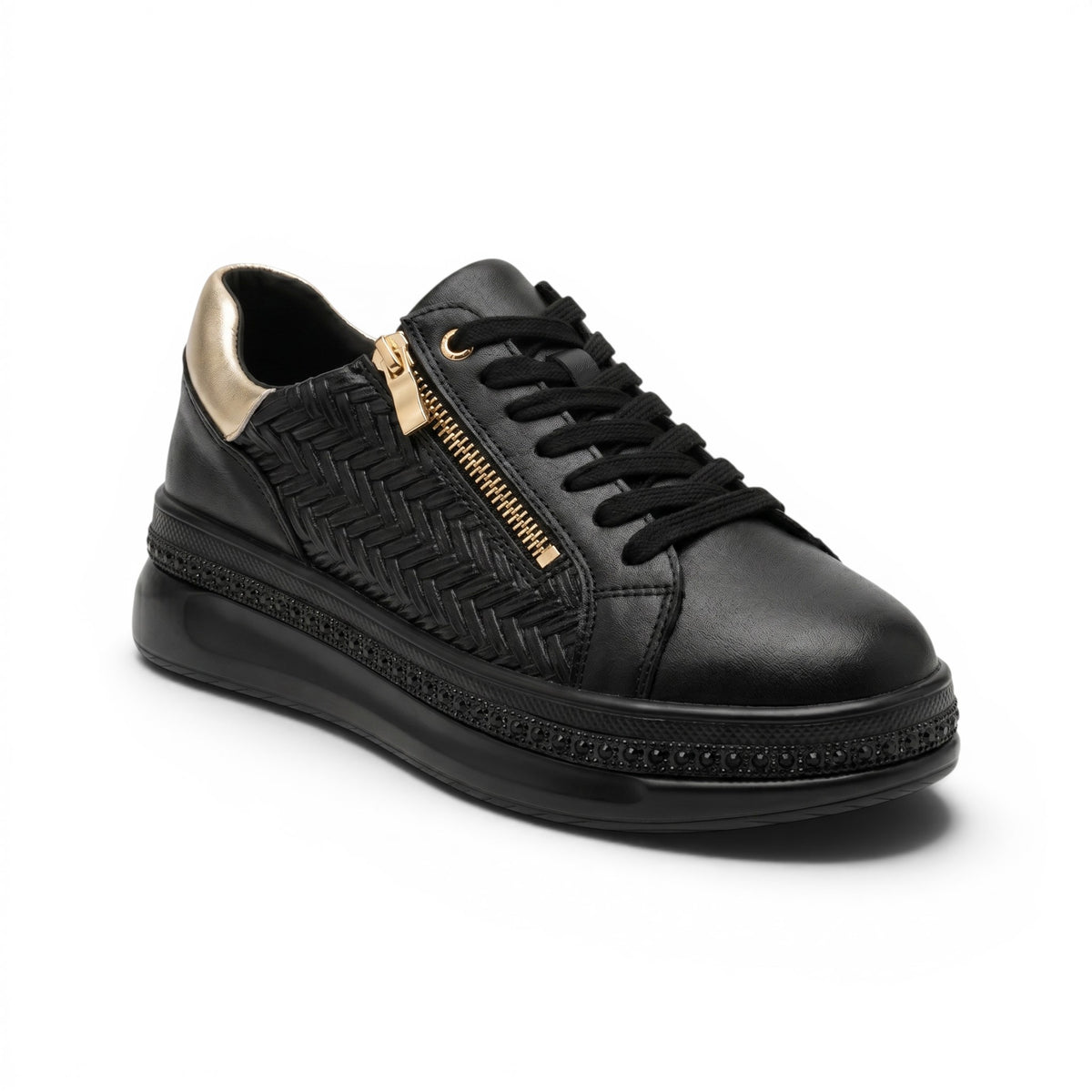 A black leather low-top sneaker with a gold zipper, black laces, and a textured chevron pattern on the side, shown on a white background.