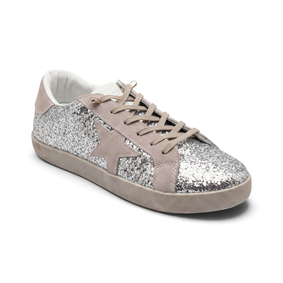 A low-top sneaker featuring a silver glitter upper, a beige suede star on the side, beige laces, and a beige rubber sole, shown against a plain white background.