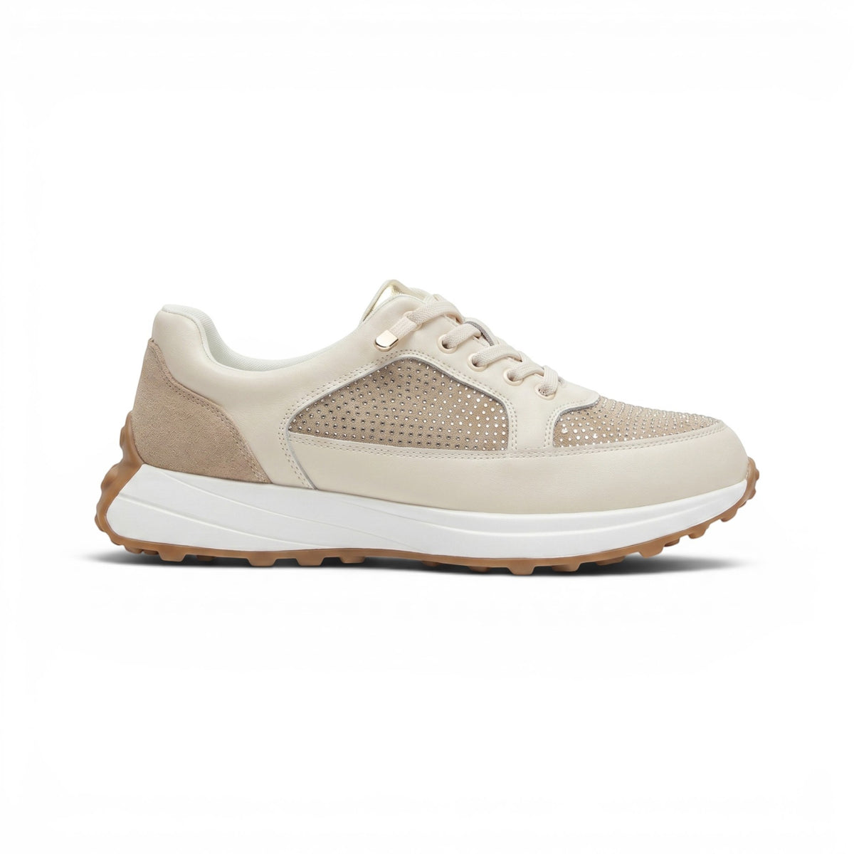 A low-top sneaker in beige and off-white with textured mesh panels, a thick white midsole, and a brown gum outsole, shown on a clean white background.