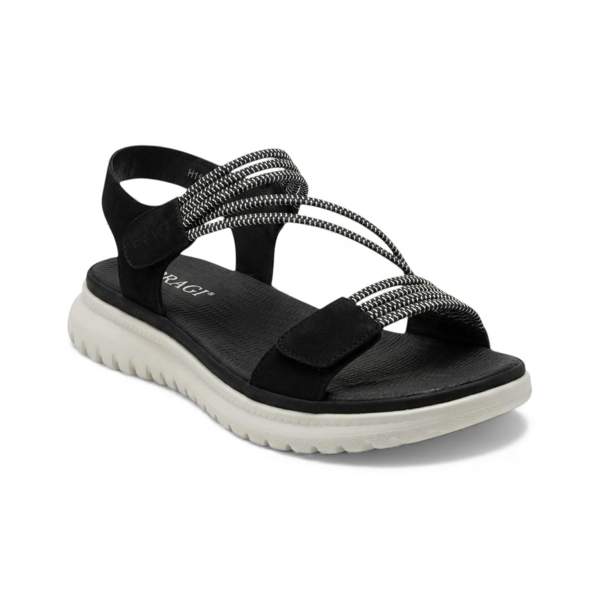 A black comfort walking sandal with adjustable straps, a cushioned footbed and lightweight flexible sole for walking, travel and everyday wear.